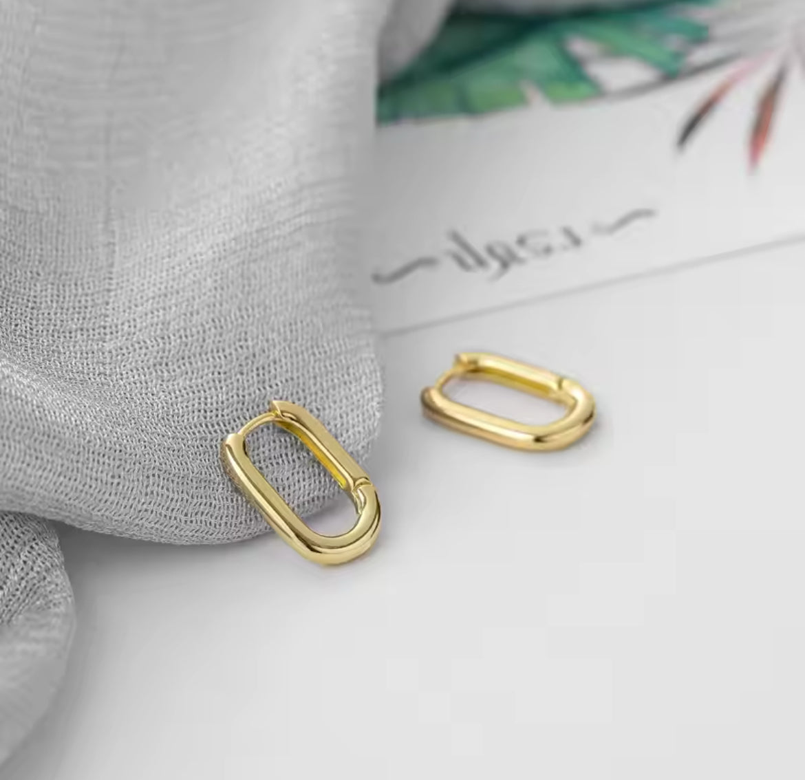 gold statement earrings, rectangular hoops, hoops in gold